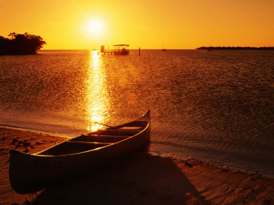 Canoe On Beach At Sunset, Kingston Keys, Ten Thousand Islands, Everglades National Park, Usa by Witold Skrypczak Pricing Limited Edition Print image