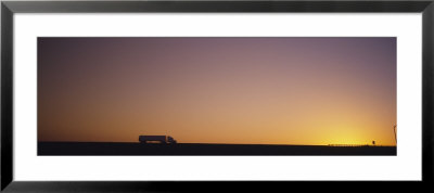 Silhouette Of A Truck Moving On A Highway, Interstate 5, California, Usa by Panoramic Images Pricing Limited Edition Print image