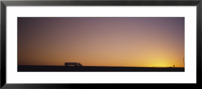 Silhouette Of A Truck Moving On A Highway, Interstate 5, California, Usa by Panoramic Images Pricing Limited Edition Print image