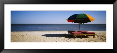 Two Beach Beds Under An Umbrella On The Beach, Biloxi, Mississippi, Usa by Panoramic Images Pricing Limited Edition Print image