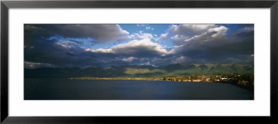 Clouded Sky Over A Lake, Flathead Lake, Swan Range, Polson, Montana, Usa by Panoramic Images Pricing Limited Edition Print image