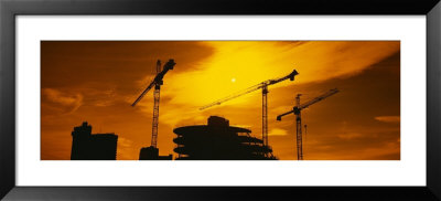 Silhouette Of Cranes At A Construction Site, London, England by Panoramic Images Pricing Limited Edition Print image