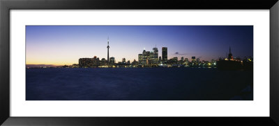 Buildings Lit Up At Dusk, Toronto, Ontario, Canada by Panoramic Images Pricing Limited Edition Print image