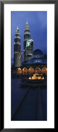 Twin Towers Lit Up At Dusk, Petronas Towers, Kuala Lumpur, Malaysia by Panoramic Images Pricing Limited Edition Print image