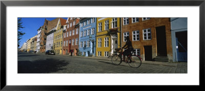 Woman Riding A Bicycle, Copenhagen, Denmark by Panoramic Images Pricing Limited Edition Print image