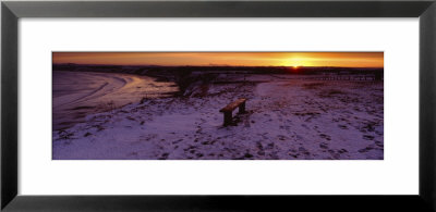 Bench On A Snow Covered Landscape, Filey Bay, Yorkshire, England, United Kingdom by Panoramic Images Pricing Limited Edition Print image