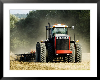 4 Wheel Drive Tractor Pulling A Disc Harrow, Cotswolds, England by Martin Page Pricing Limited Edition Print image