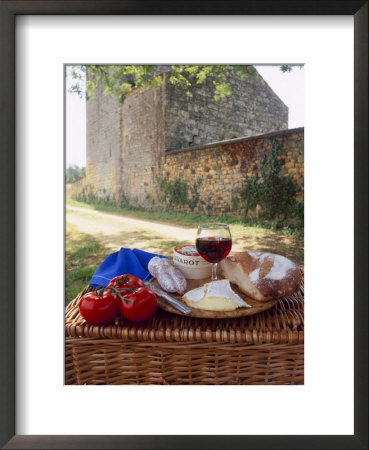 Picnic Lunch Of Bread, Cheese, Tomatoes And Red Wine On A Hamper In The Dordogne, France by Michael Busselle Pricing Limited Edition Print image