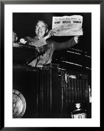 Victorious President Harry Truman Displaying Chicago Daily Tribune Headline, Dewey Defeats Truman by W. Eugene Smith Pricing Limited Edition Print image