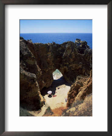 Rock Formations Line The Coast, Algarve, Portugal by Tom Teegan Pricing Limited Edition Print image