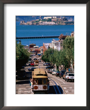 Cable Car And Other Traffic On Street With Alcatraz In Distance, San Francisco, Usa by John Elk Iii Pricing Limited Edition Print image