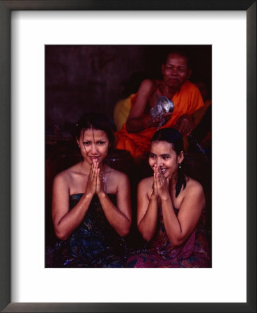 Monk Blessing Two Women At Angkor Wat, Angkor, Cambodia by Michael Coyne Pricing Limited Edition Print image