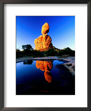 Balanced Rock Reflected In Pool At Sunrise, Arches National Park, Utah by David Tomlinson Pricing Limited Edition Print image