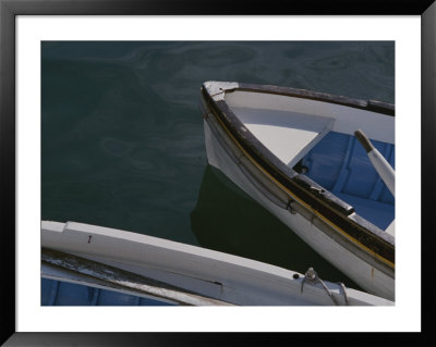 Detail Of Two Wooden Rowboats Docked Along The Cinque Terre Coast by Raul Touzon Pricing Limited Edition Print image