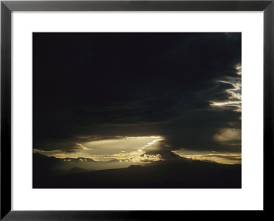 Twilight View Of Clouds Over Mountains by Raul Touzon Pricing Limited Edition Print image