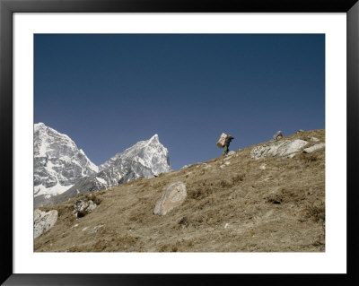 A Porter Carrying A Full Load In The Everest Region Of Nepal by Michael S. Lewis Pricing Limited Edition Print image