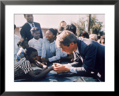 Robert F. Kennedy Meeting With Some African American Kids During Political Campaign by Bill Eppridge Pricing Limited Edition Print image