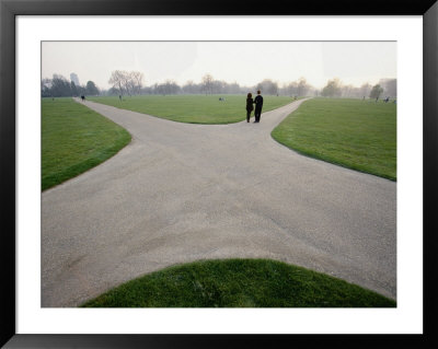 A Couple Stand Near The Intersection Of Paved Paths In Hyde Park by Paul Chesley Pricing Limited Edition Print image