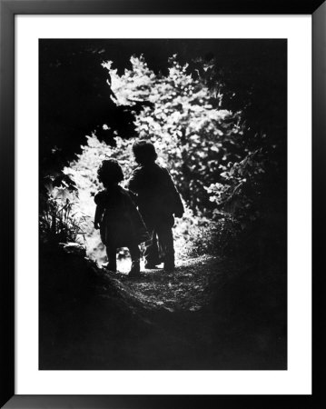 Children Of Photographer With Eugene Smith Walking Hand In Hand In Woods Behind His Home by W. Eugene Smith Pricing Limited Edition Print image