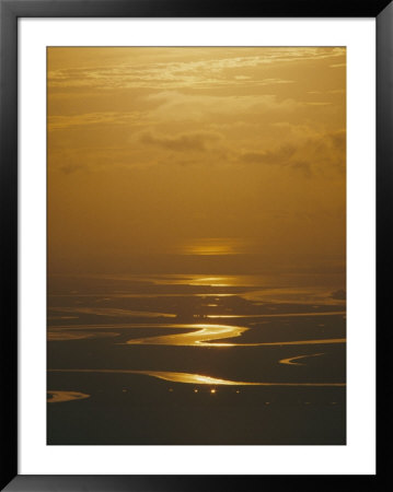 Twilight Over A Wetland With Meandering Streams by Bill Curtsinger Pricing Limited Edition Print image