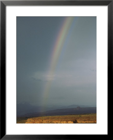 A Rainbow Touches Down Over Rainbow Plateau Following A Summer Thunder Storm by Bill Hatcher Pricing Limited Edition Print image