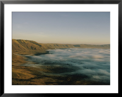 Fog Over Ngorongoro Crater by Emory Kristof Pricing Limited Edition Print image