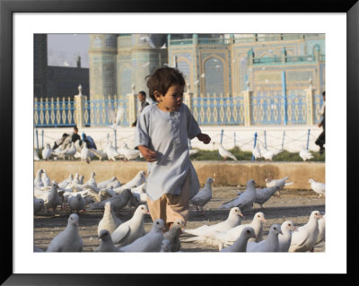 Child Chasing The Famous White Pigeons, Mazar-I-Sharif, Afghanistan by Jane Sweeney Pricing Limited Edition Print image