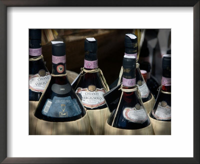 Bottles Of Chianti Displayed, San Gimignano, Italy by Robert Eighmie Pricing Limited Edition Print image