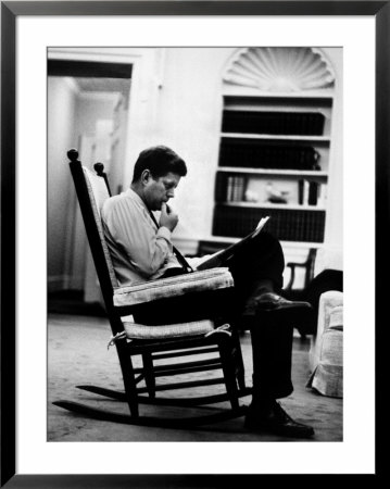 President John F. Kennedy Sitting Alone, Thoughtfully, In His Rocking Chair In The Oval Office by Paul Schutzer Pricing Limited Edition Print image