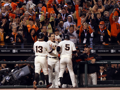 Texas Rangers V San Francisco Giants, Game 1: Juan Uribe, Cody Ross, Pat Burrell, Bruce Bochy by Jed Jacobsohn Pricing Limited Edition Print image