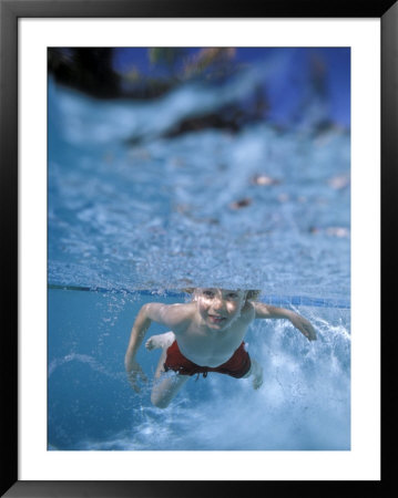 Little Boy Swimming Underwater by James Gritz Pricing Limited Edition Print image