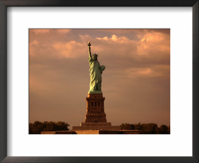 Statue Of Liberty At Sunrise, New York City, New York, Usa by Angus Oborn Pricing Limited Edition Print image