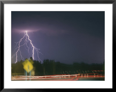 Lightning And Time Exposure Of Taillights On A Rainy Road by Roy Gumpel Pricing Limited Edition Print image