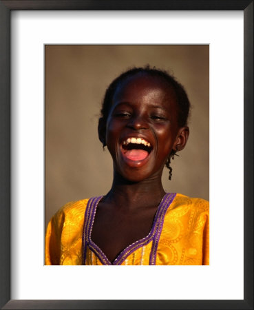 Portrait Of A Young Girl Laughing, Djenne, Mopti, Mali by Ariadne Van Zandbergen Pricing Limited Edition Print image