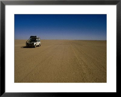 Car Crossing Sahara Desert, Algeria by Peter Ptschelinzew Pricing Limited Edition Print image