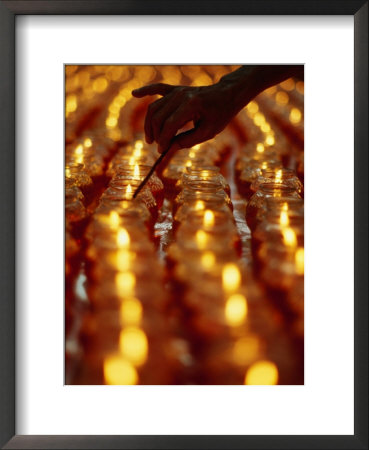 Hand Lighting Candles At Taoist Ceremony, Singapore, Singapore by Michael Coyne Pricing Limited Edition Print image