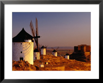 Windmills And Castle Of Cresteria Manchega At Sunrise, Consuegra, Castilla-La Mancha, Spain by Witold Skrypczak Pricing Limited Edition Print image
