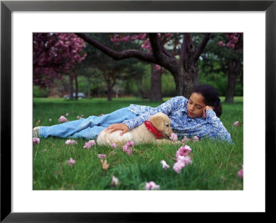 10-Year-Old Girl With Golden Retriever Puppy by Frank Siteman Pricing Limited Edition Print image