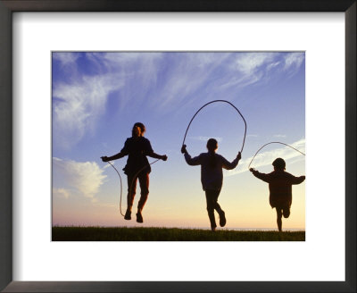 Silhouette Of Children Jumping Rope Outdoors by Mitch Diamond Pricing Limited Edition Print image