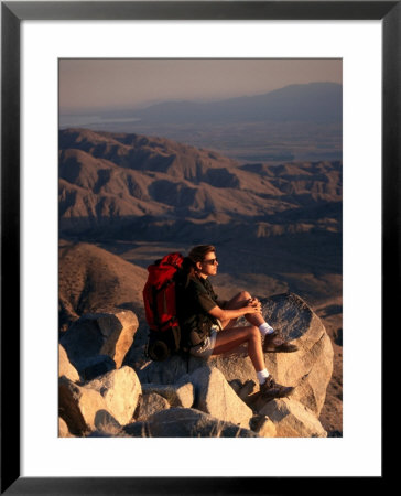 Hiking Through Joshua Tree State Park, California, Usa by Cheyenne Rouse Pricing Limited Edition Print image