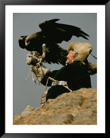 A Kazakh Man Supports His Trained Golden Eagle by David Edwards Pricing Limited Edition Print image