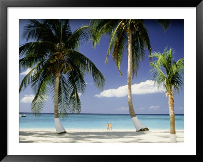 View Of Couple Walking On Beach, Cayman Islands by Anne Flinn Powell Pricing Limited Edition Print image