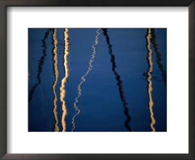 Reflection Of Sailboat Masts In Lake Maggiore, Locarno, Switzerland by Martin Moos Pricing Limited Edition Print image