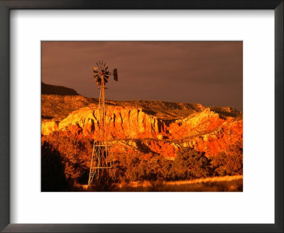 Windmill Against Sandstone Cliffs At Ghost Ranch, New Mexico, Usa by Ralph Lee Hopkins Pricing Limited Edition Print image