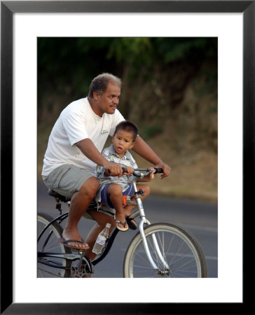 Father And Son Riding A Bicycle, Papeete, French Polynesia by Paul Kennedy Pricing Limited Edition Print image