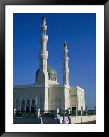 Men Walking Past Burami Mosque, Oman by Chris Mellor Pricing Limited Edition Print image