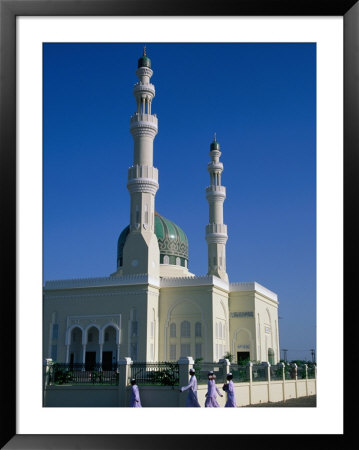 Men Walking Past Burami Mosque, Oman by Chris Mellor Pricing Limited Edition Print image