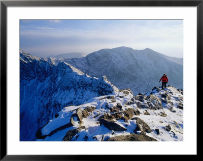 Walking Narrow Ridge Between Carrauntoohill And Beenkeragh In The Magillicuddy Reeks, Ireland by Gareth Mccormack Pricing Limited Edition Print image
