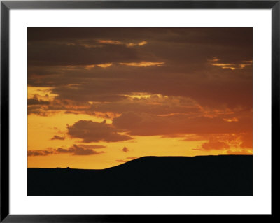 Low Sunlight Colors The Sky And Clouds In Shades Of Orange by Raymond Gehman Pricing Limited Edition Print image
