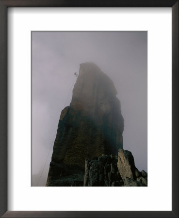 Climber Descending El Obelisco In Bolivia by Bobby Model Pricing Limited Edition Print image